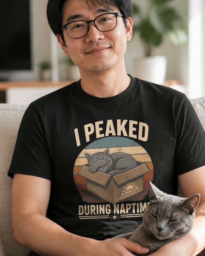Cat lover wearing a Cranky Kitten cat tee